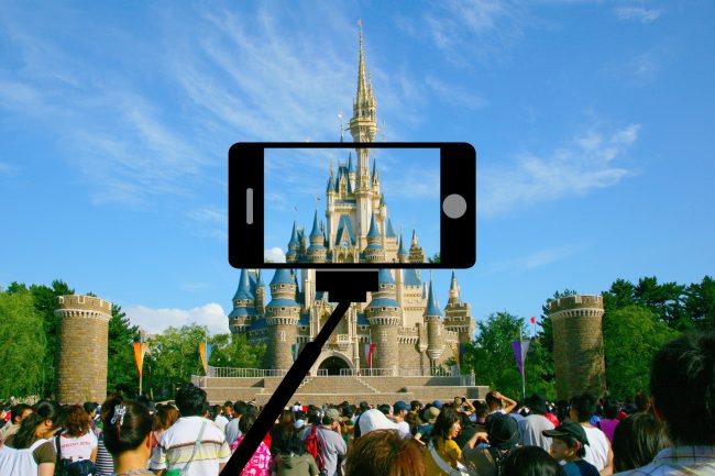 Selfie stick at Magic Kingdom. Depositphotos_29630245_modified