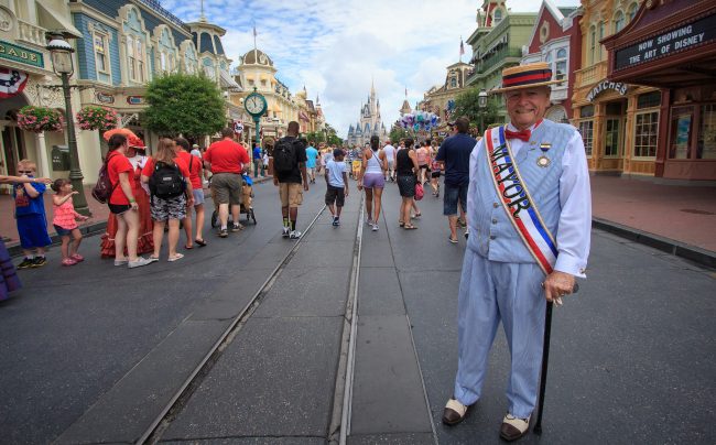 The late George Weaver, longtime Mayor of Main Street USA, in Disney's Magic Kingdom Park. Photo credit: Scott Smith via Flikr, Creative Commons Attribution-NonCommercial-NoDerivs 2.0 Generic (CC BY-NC-ND 2.0)