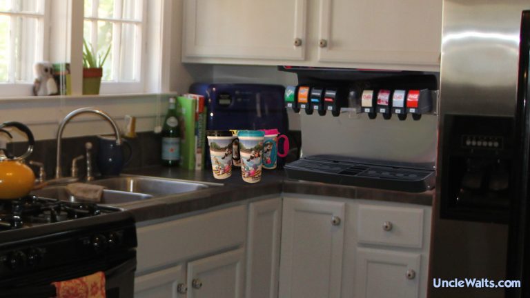 A Rapid Fill soda dispenser installed in a home. Photo includes images by Clubcola soda machine [CC BY-SA 3.0], via Wikimedia Commons, and orlando-florida.net.