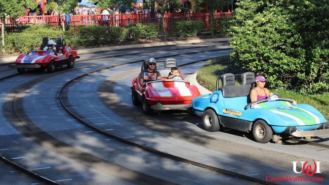 A few of the remaining functional cars at Tomorrowland Speedway. Photo by Theme Park Tourist [CC BY 2.0], via Wikimedia Commons.