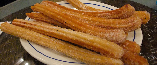 Churros. Mmm... churros. Photo by Mark Mitchell [CC BY 2.0] via Flickr. Churros. Mmmmm....