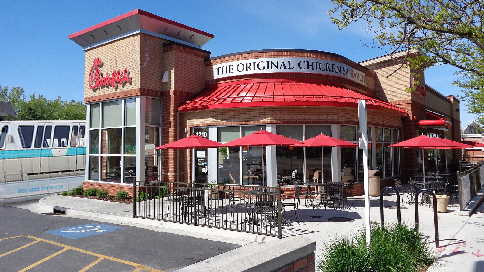 The monorail in a Chick-fil-A drive-thru. Photo by Saalebaer [CC0] via Wikimedia Commons.