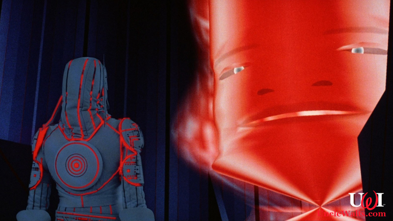 Someone who may or may not be our source confronting the Master Control Program. Photo © 1982 Disney.