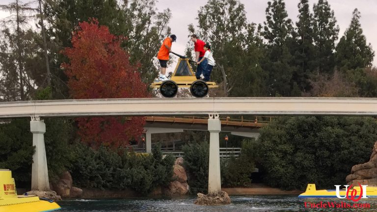 Guests try out the new Disneyland handcar on the former monorail track. Photo by FASTILY [CC BY-SA 4.0] via Wikimedia and the National Park Service [CC0].