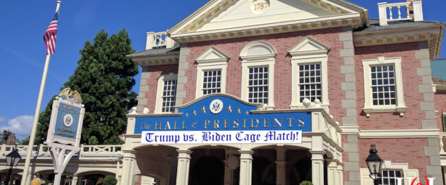 The new Hall of Presidents, featuring a Trump vs. Biden Animatronic Cage Fight. Photo by elisfkc [CC BY-SA 2.0] via Wikimedia.